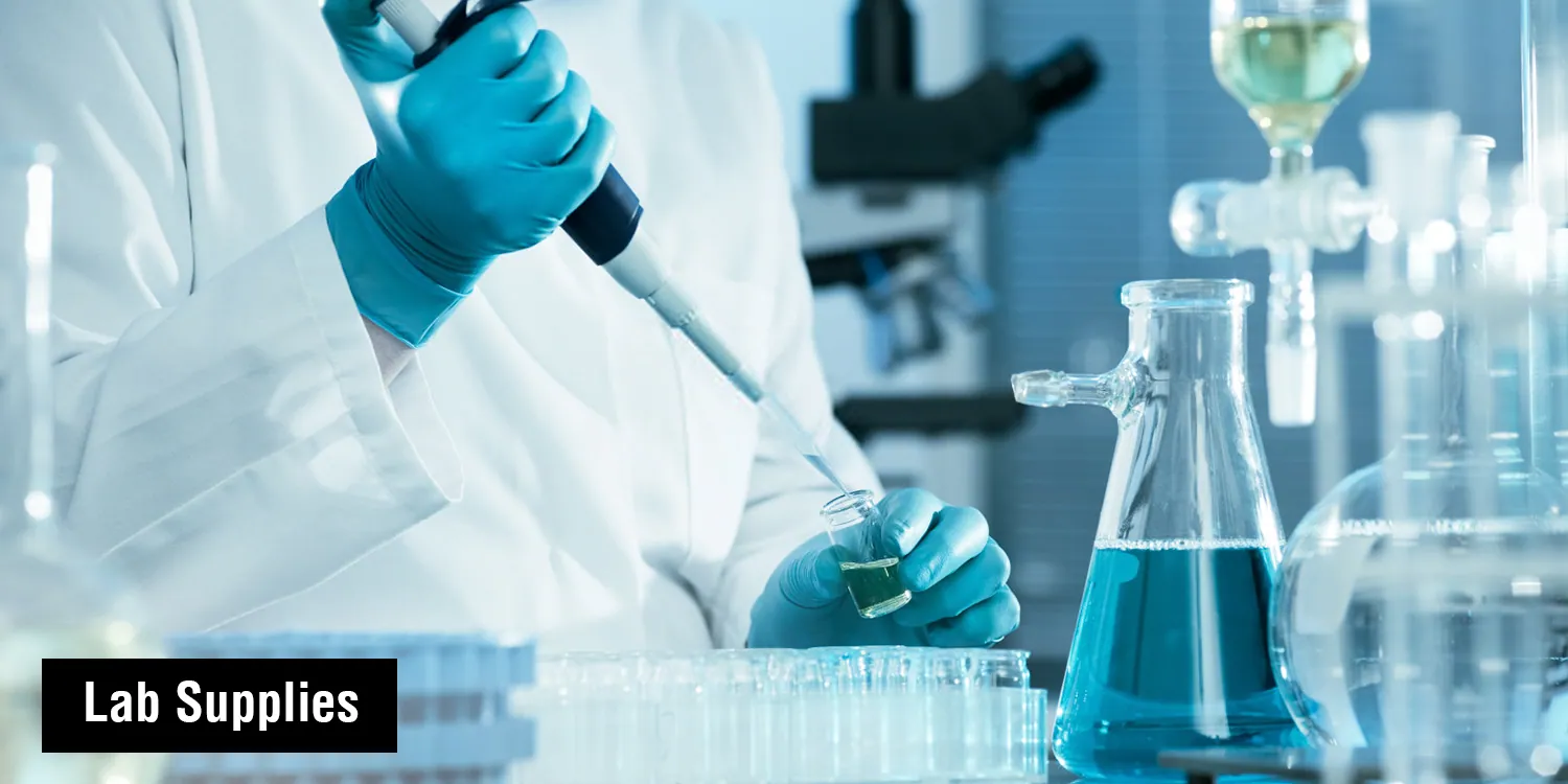 A pipette and glassware on a laboratory bench: our lab range
